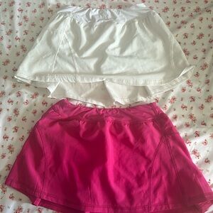 two GB girls pink and white skirts for athletics size M